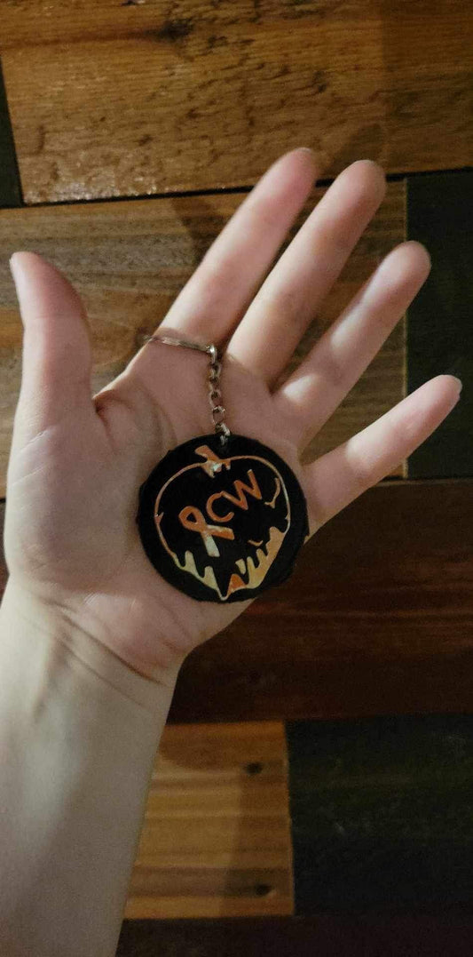 CW Merch Apple  Keychain