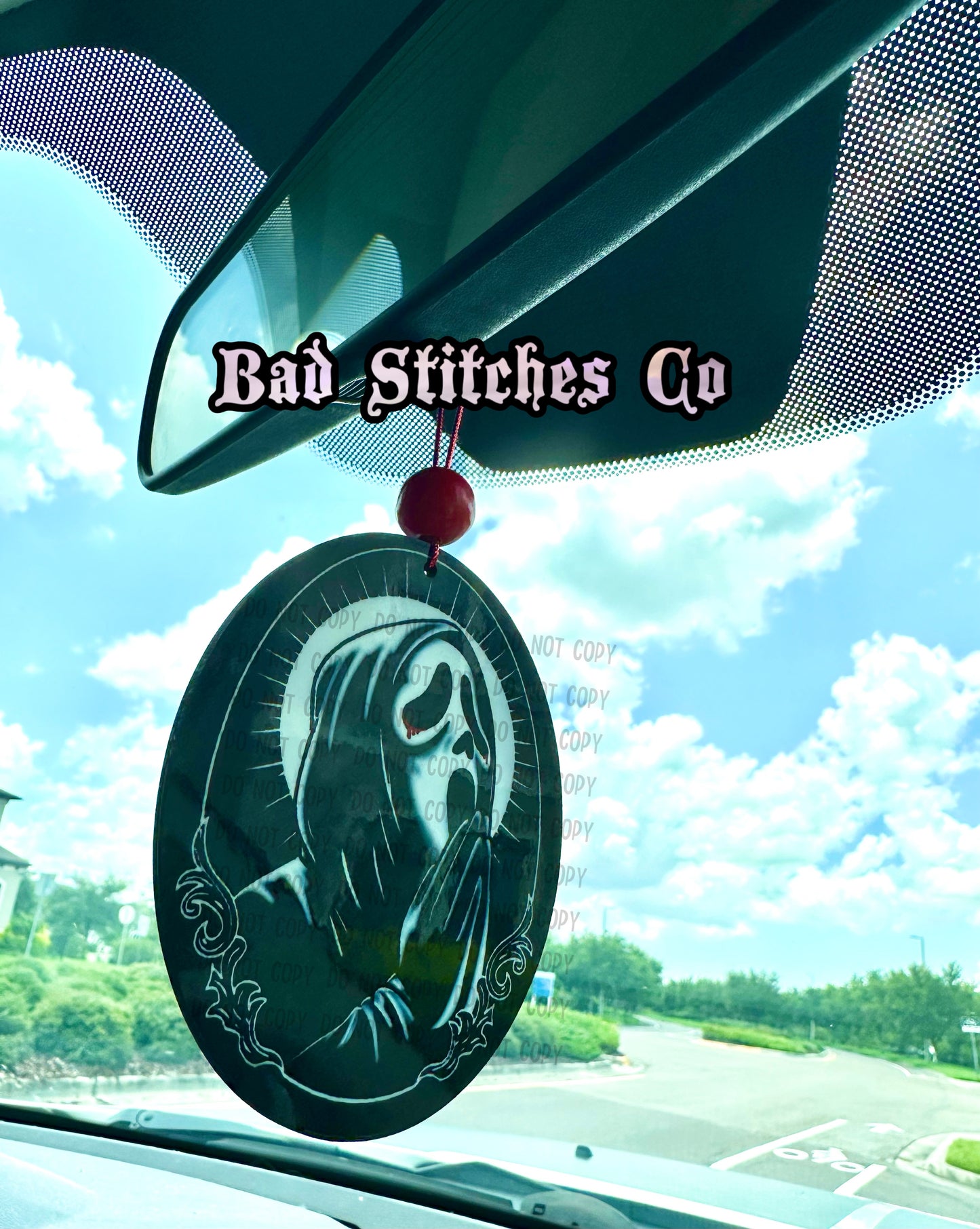Saint GF car charm