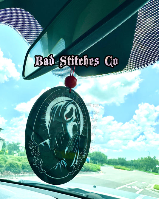Saint GF car charm