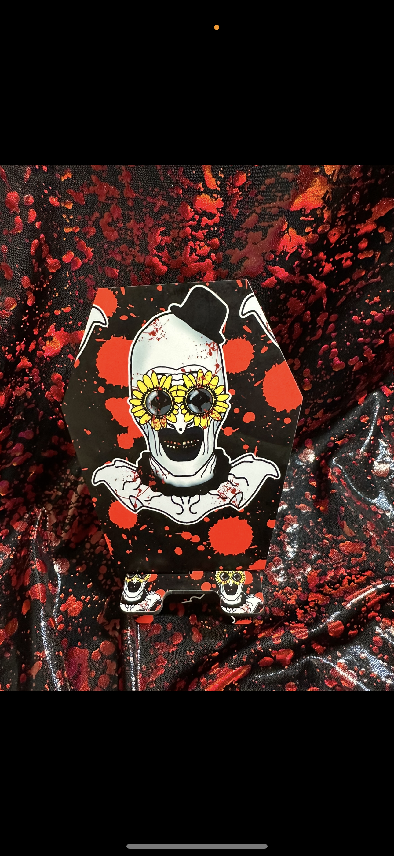 Art coffin phone stand